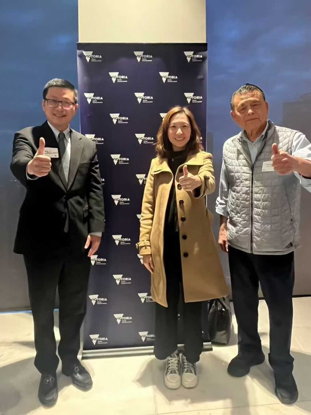 At the Invest Victoria backdrop